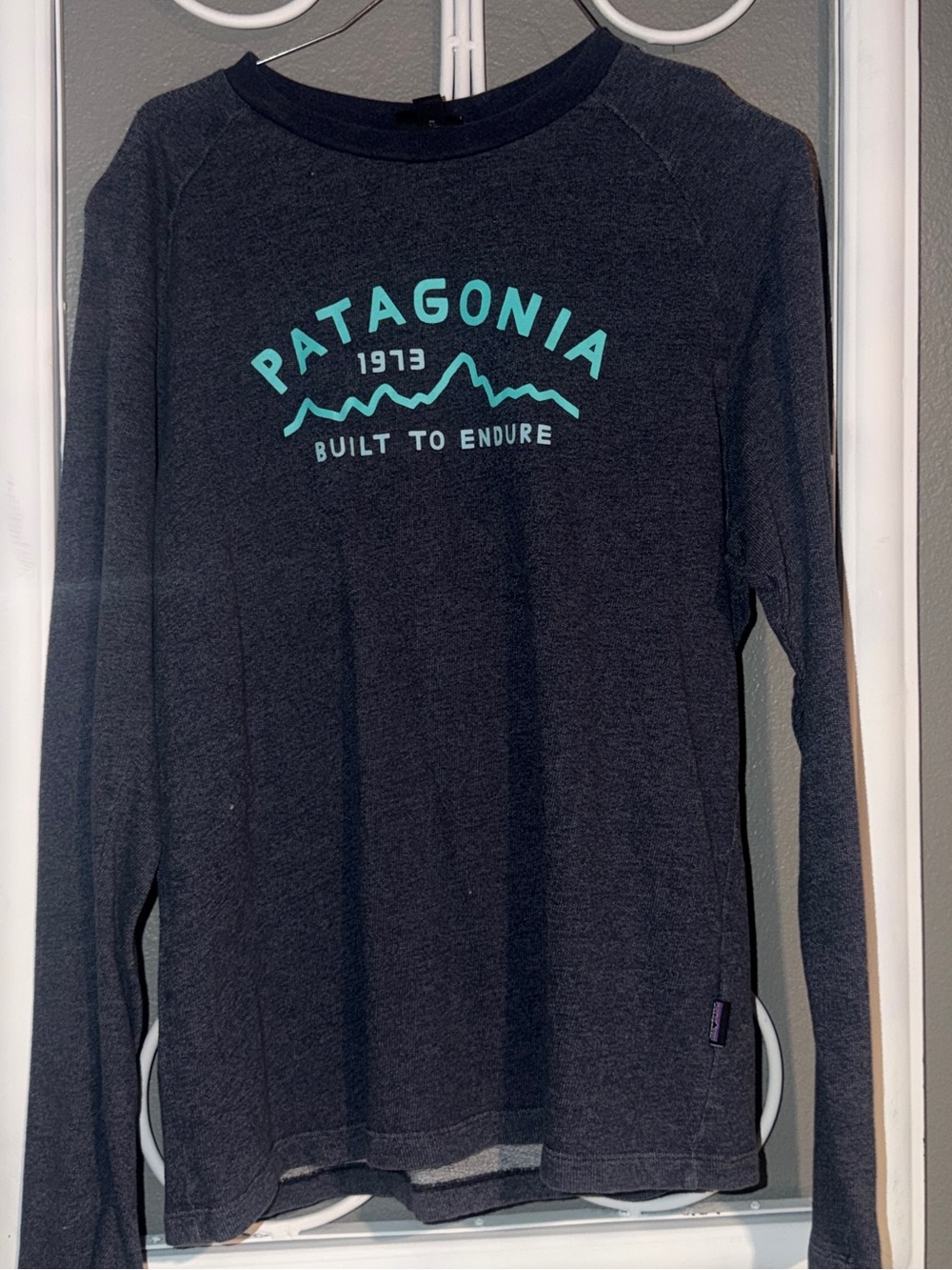 Patagonia Navy Blue Long Sleeve Tee with Multicolor Logo